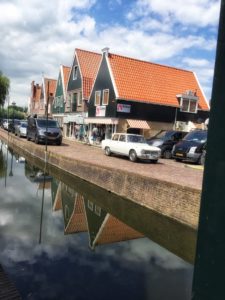 Volendam canal, nice reflections in the water, and an old Alfa Romeo.