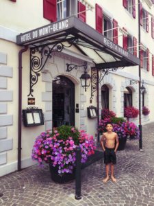 After a swim in Lake Geneva, we walk across the street for a clothes change at the hotel.