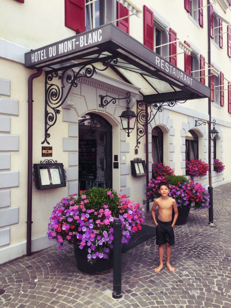 After a swim in Lake Geneva, we walk across the street for a clothes change at the hotel.