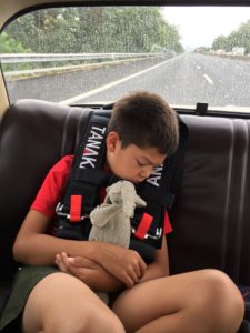 Raining from Sorrento to Perugia. Jake takes a nap.