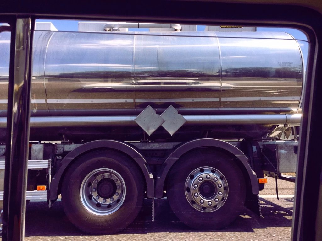 Many milk trucks on the highways. See our reflection?