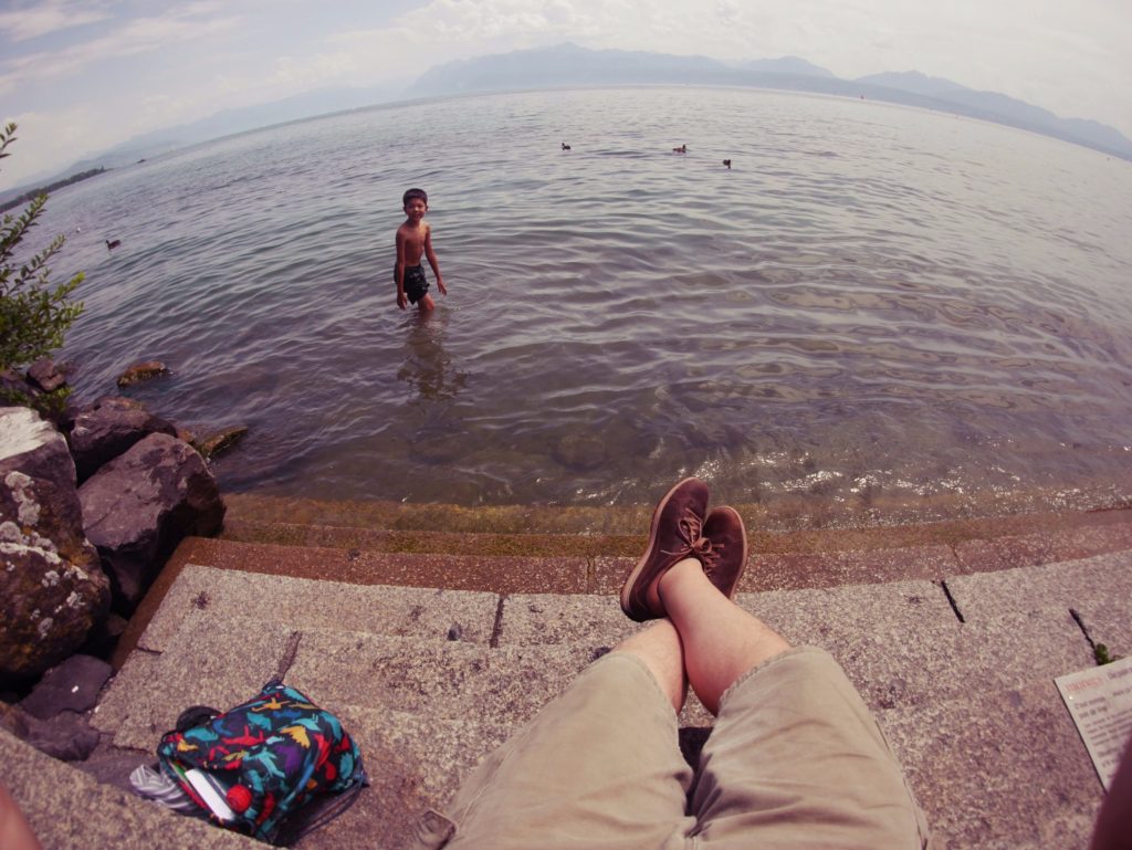 Jake taking a dip in Lake Geneva. Take shoes and shirt off and jump in. Life as it should be.