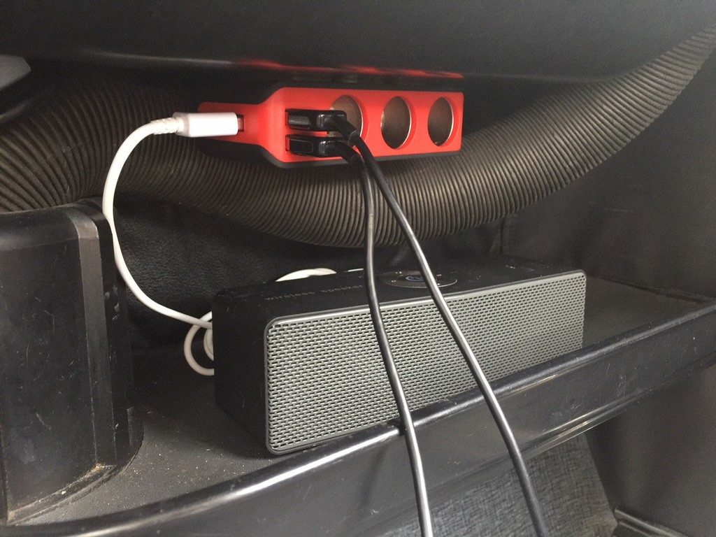 The parcel tray was a handy place to mount the cigarette lighter and put the Bluetooth speaker.