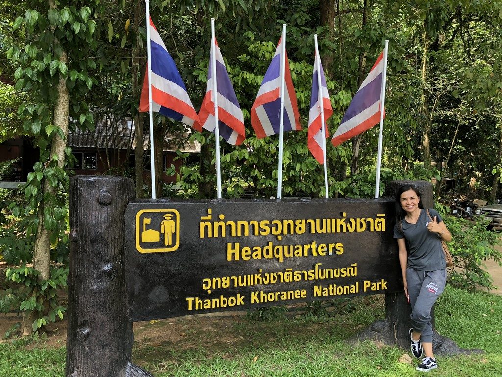 Orn will always pose with a sign! This is the park with the roots we are scanning.