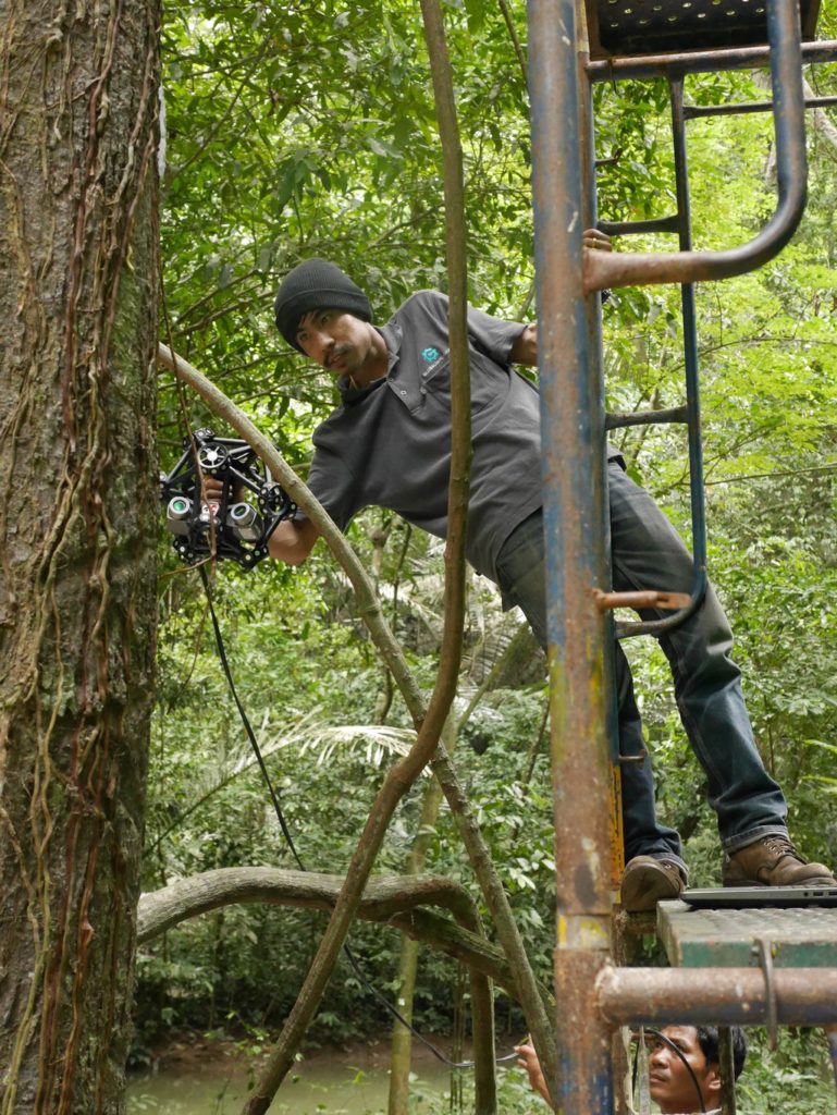 Fluke leans out for a very long root. Up in the scaffolds with the Creaform Metra 3D laser scanner.