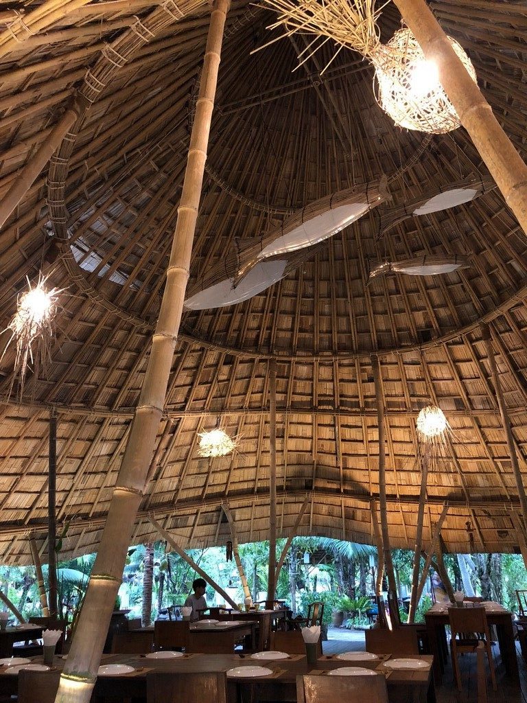 Fluke sitting by himself in the Ruen Mai restaurant. Designed to look like a fish trap.